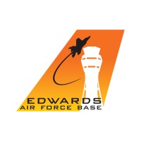 A yellow and black sign displaying the text "EDWARDS AIR FORCE BASE.